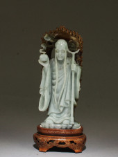 A CARVED JADE IMMORTAL STATUE<