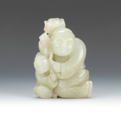 A Carved Jade Man with Child and