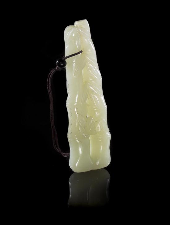 A Carved Jade Toggle of bamboo form