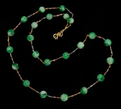 A Carved Jadeite Bead Necklace