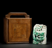 A CARVED JADEITE BOULDER<br>A