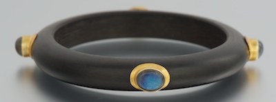 A Carved Mahogany Bangle With