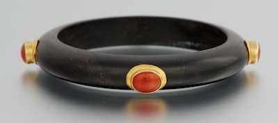 A Carved Mahogany Bangle With