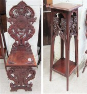 A CARVED MAHOGANY HALL CHAIR A