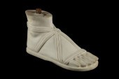 A CARVED MARBLE MODEL OF A SAN