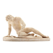 A CARVED MARBLE NUDE AFTER  TH