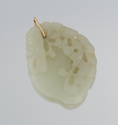 A Carved Nephrite Jade Pendant on