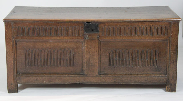 A carved oak chest 17th Century