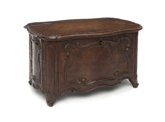 A Carved Oak Diminutive Chest