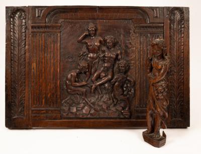 A carved oak panel with allegorical