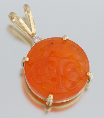 A Carved Orange Jade and Diamond