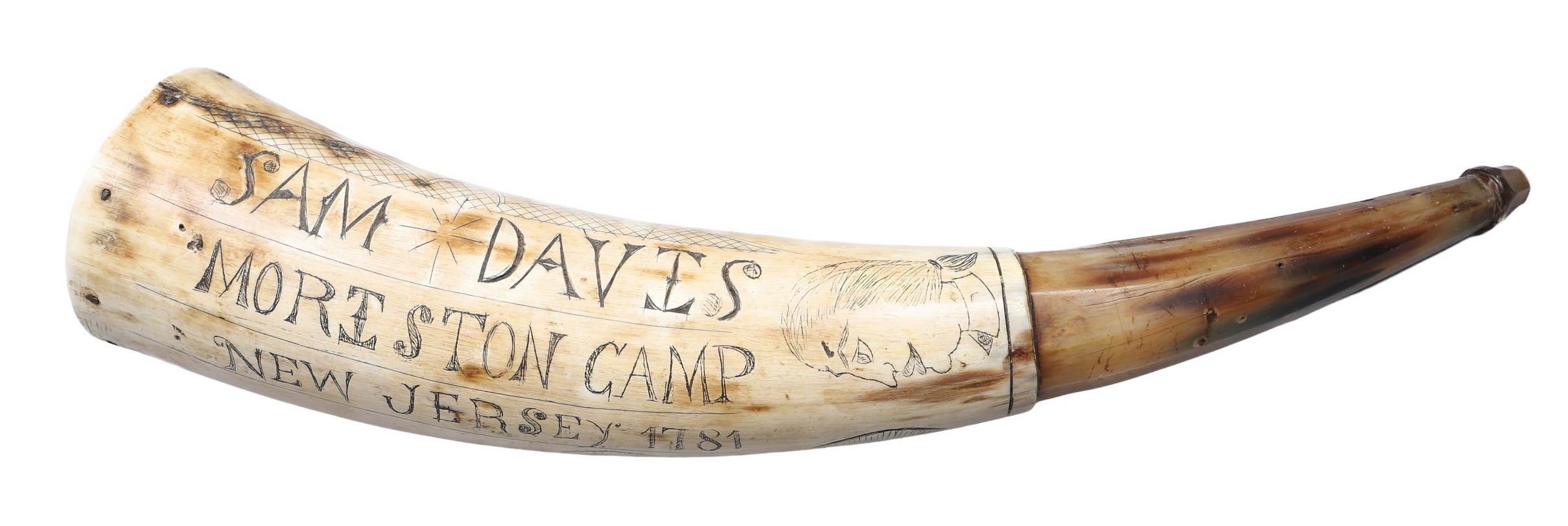 A carved powder horn of uncertain