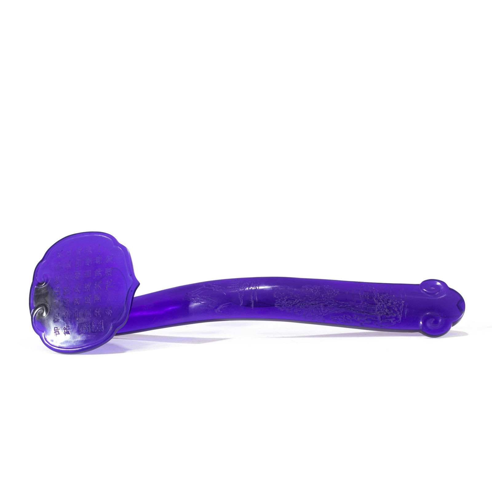 A CARVED PURPLE GLASS RUYI SCEPTREA