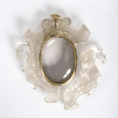 A carved rock crystal frame,