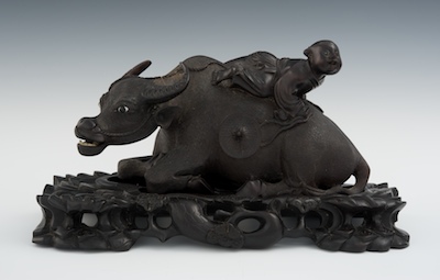 A Carved Rosewood Grouping of Ox