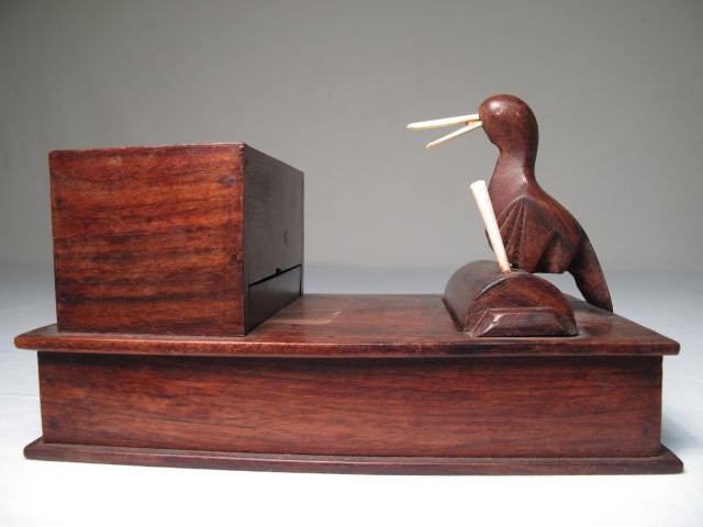 A carved rosewood novelty box