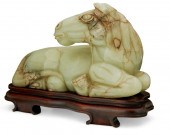 A CARVED SEMIPRECIOUS STONE HO