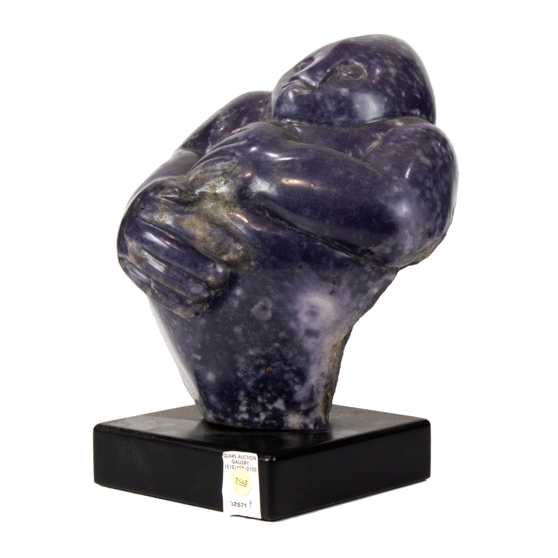 A CARVED SERPENTINE SHONA SCULPTURE
