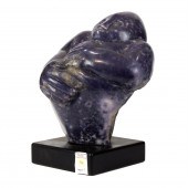 A CARVED SERPENTINE SHONA SCUL