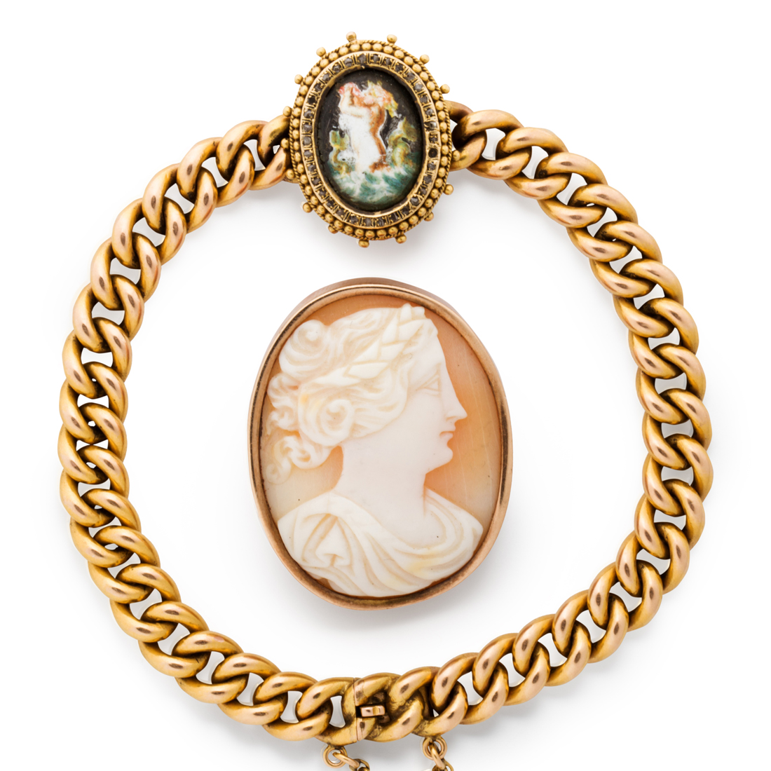 A CARVED SHELL CAMEO BROOCH AND