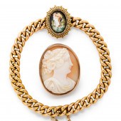 A CARVED SHELL CAMEO BROOCH AN