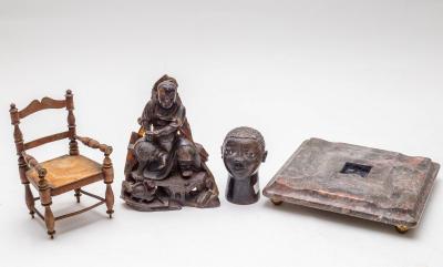 A carved soap stone figure of