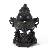 A CARVED SPINACH GREEN JADE CE