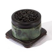 A CARVED SPINACH GREEN JADE CO