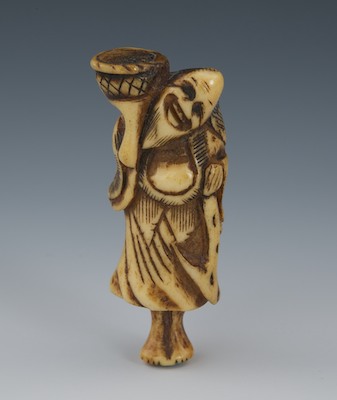 A Carved Staghorn Netsuke of a