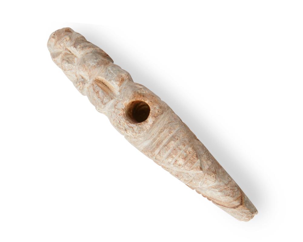 A CARVED STONE EFFIGY PIPEAn