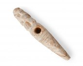 A CARVED STONE EFFIGY PIPEAn A