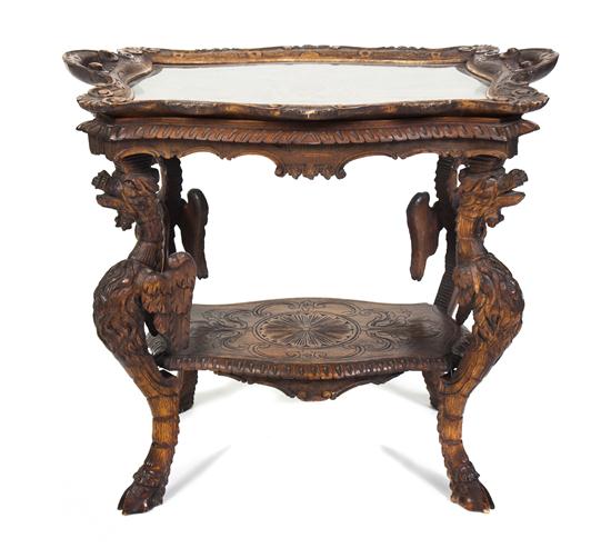 A Carved Tray-Top Table having a