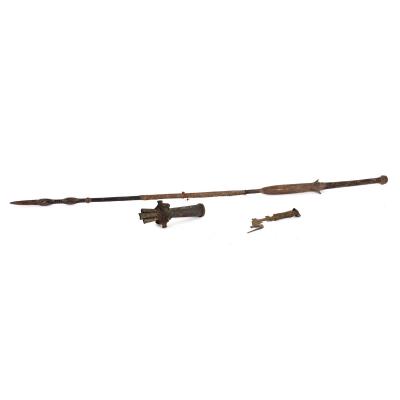 A carved tribal spear with hide