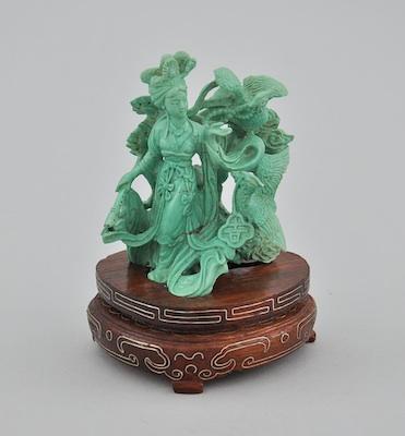 A Carved Turquoise Female