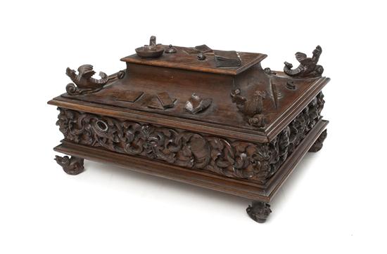 A Carved Walnut Writing Box