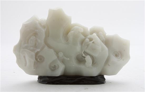A Carved White Hardstone Boulder