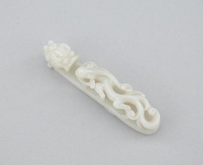 A Carved White Jade Dragon Belt