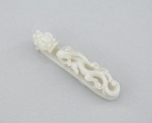 A Carved White Jade Dragon Bel