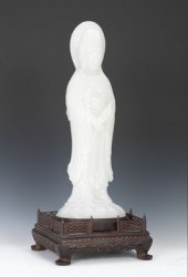 A Carved White Jade Quan Yin w