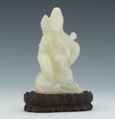 A Carved White Jade Quan Yin Carved