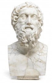 A carved white marble bust of