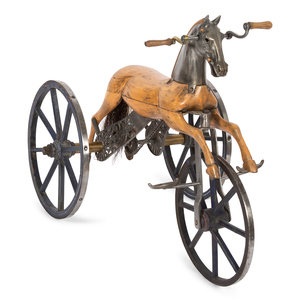 A Carved Wood and Cast Metal