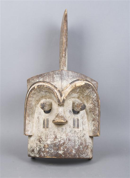 A Carved Wood and Painted