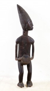A Carved wood Benin style figu