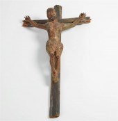 A CARVED WOOD CRUCIFIXA carved
