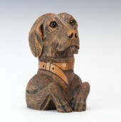 A Carved Wood Figural Dog Toba
