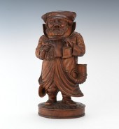 A Carved Wood Figural Tobacco