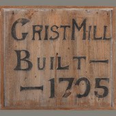 A Carved Wood 'Grist Mill' Tra