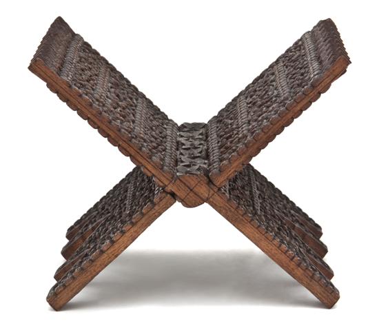 A Carved Wood Koran Stand of X-form
