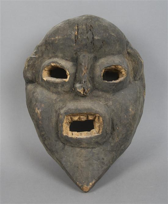 A Carved Wood Mask West African